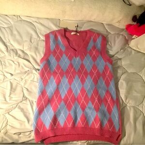 Pink and blue knitted sweater vest